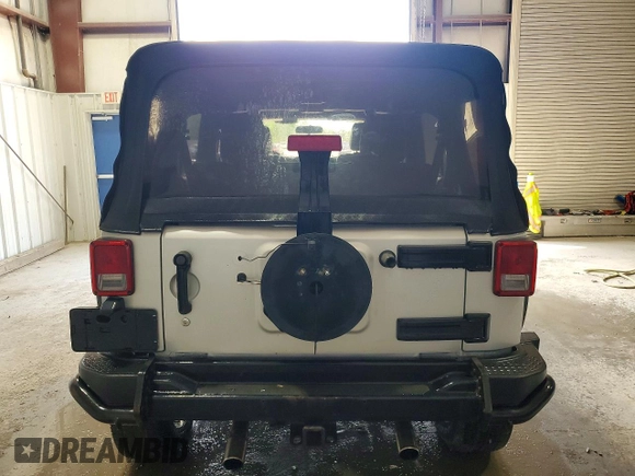 ✅ 2012 Jeep Wrangler Unlimited Call of Duty MW3 • VIN: 1C4BJWFG0CL248636 • Лот: 52845096. Опубликован ранее на Copart с пробегом 153 665 миль. Бесплатный доступ к архиву аукционных продаж из США и подробный отчёт об истории автомобиля на DreamBid. Изображение 6.