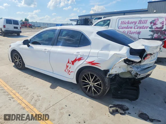 ✅ 2023 Toyota Camry SE • VIN: 4T1G11AK4PU148877 • Лот: 56824586. Опубликован ранее на Copart с пробегом 71 228 миль. Бесплатный доступ к архиву аукционных продаж из США и подробный отчёт об истории автомобиля на DreamBid. Изображение 2.