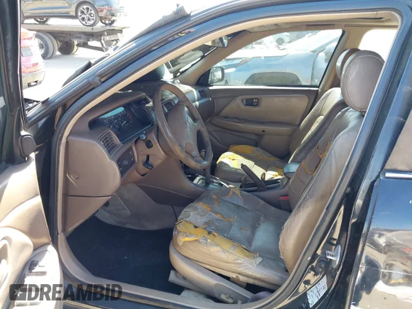 ✅ 2000 Toyota Camry LE • VIN: 4T1BG22K2YU923417 • Lot: 45031403. Wystawiony na IAAI z przebiegiem 374 688 mil. Bezpłatny archiwum sprzedaży aukcyjnych z USA i szczegółowy raport historii pojazdu na DreamBid. Zdjęcie 5.
