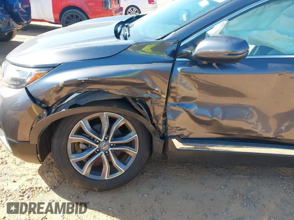 ✅ 2021 Honda CR-V Touring • VIN: 2HKRW2H94MH641732 • Lot: 45396935. Wystawiony na IAAI z przebiegiem 64 053 mil. Bezpłatny archiwum sprzedaży aukcyjnych z USA i szczegółowy raport historii pojazdu na DreamBid. Zdjęcie 6.