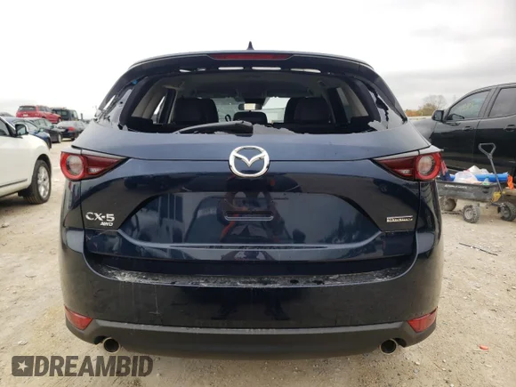 ✅ 2021 Mazda CX-5 Carbon Edition • VIN: JM3KFBCM7M0501093 • Лот: 68994462. Опубліковано раніше на Copart з пробігом 5 224 миль. Безкоштовний доступ до архіву аукціонних продажів зі США та докладний звіт про історію автомобіля на DreamBid. Зображення 6.
