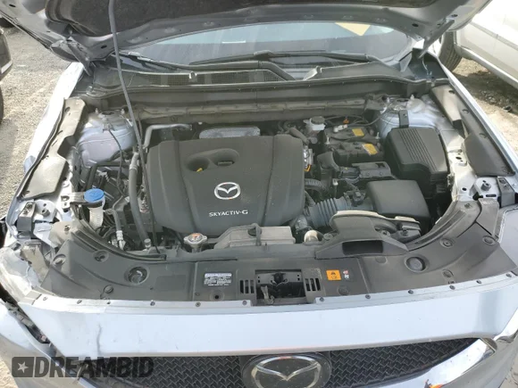 ✅ 2020 Mazda CX-5 Touring • VIN: JM3KFBCM7L0790653 • Lot: 65263282. Wystawiony na Copart z przebiegiem 59 759 mil. Bezpłatny archiwum sprzedaży aukcyjnych z USA i szczegółowy raport historii pojazdu na DreamBid. Zdjęcie 7.