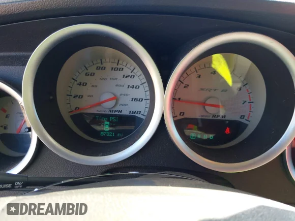✅ 2006 Dodge Charger SRT-8 • VIN: 2B3KA73W66H276638 • Lot: 44307812. Wystawiony na IAAI z przebiegiem 87 321 mil. Bezpłatny archiwum sprzedaży aukcyjnych z USA i szczegółowy raport historii pojazdu na DreamBid. Zdjęcie 7.