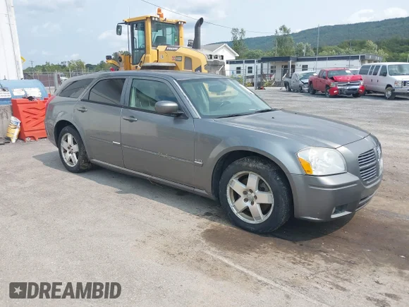 ✅ 2005 Dodge Magnum R/T • VIN: 2D4GZ58295H557809 • Lot: 43082034. Listed on IAAI with 189,469 mi. Free auction sales archive from the USA and detailed vehicle history report at DreamBid. Image 1.