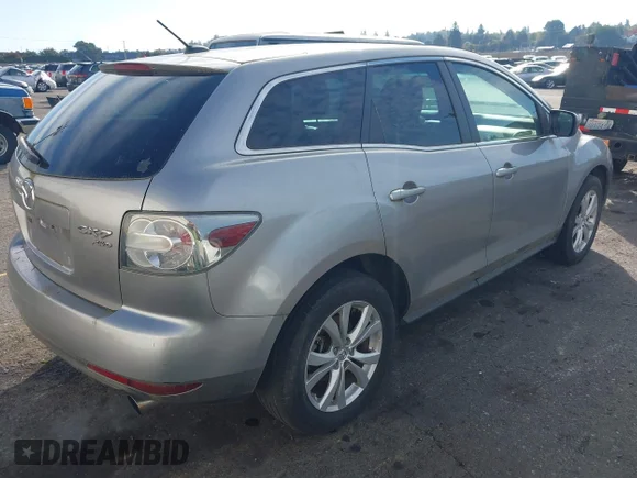 ✅ 2010 Mazda CX-7 Touring • VIN: JM3ER4WL6A0319254 • Lot: 43465546. Wystawiony na IAAI z przebiegiem 129 692 mil. Bezpłatny archiwum sprzedaży aukcyjnych z USA i szczegółowy raport historii pojazdu na DreamBid. Zdjęcie 4.