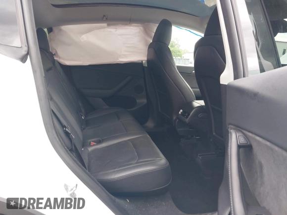 ✅ 2024 Tesla Model Y Long Range • VIN: 7SAYGDEE1RF036887 • Lot: 45092758. Listed on IAAI with 50,948 mi. Free auction sales archive from the USA and detailed vehicle history report at DreamBid. Image 8.