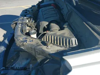 2014 Chevrolet Traverse LT z VIN 1GNKRHKD5EJ134069, wystawiony jako IAAI lot #43489428 z przebiegiem 151 134 mil mil oraz . Historia ofert i sprzedaży dostępna na DreamBid. Obrazek 20.