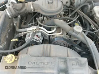 ✅ 2003 Dodge Dakota SLT • VIN: 1D7HL48X63S144573 • Lot: 42798150. Wystawiony na IAAI z przebiegiem 224 361 mil. Bezpłatny archiwum sprzedaży aukcyjnych z USA i szczegółowy raport historii pojazdu na DreamBid. Zdjęcie 13.