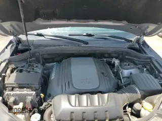 ✅ 2020 Jeep Grand Cherokee High Altitude • VIN: 1C4RJFCTXLC133672 • Лот: 64632975. Опубликован ранее на Copart с пробегом 140 799 миль. Бесплатный доступ к архиву аукционных продаж из США и подробный отчёт об истории автомобиля на DreamBid. Изображение 17.