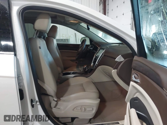 ✅ 2015 Cadillac SRX Premium Collection • VIN: 3GYFNGE39FS634488 • Lot: 44594717. Wystawiony na IAAI z przebiegiem 72 973 mil. Bezpłatny archiwum sprzedaży aukcyjnych z USA i szczegółowy raport historii pojazdu na DreamBid. Zdjęcie 5.