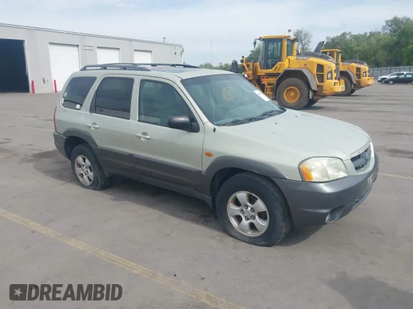 ✅ 2004 Mazda Tribute LX • VIN: 4F2YZ94174KM33941 • Лот: 45114119. Опубліковано раніше на IAAI з пробігом 185 568 миль. Безкоштовний доступ до архіву аукціонних продажів зі США та докладний звіт про історію автомобіля на DreamBid. Зображення 1.