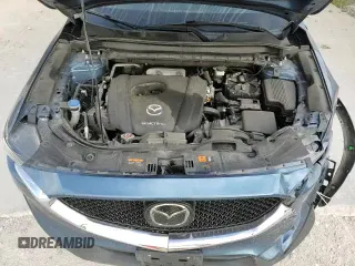 ✅ 2021 Mazda CX-5 Touring • VIN: JM3KFBCM8M1370668 • Lot: 81922665. Wystawiony na Copart z przebiegiem 86 596 mil. Bezpłatny archiwum sprzedaży aukcyjnych z USA i szczegółowy raport historii pojazdu na DreamBid. Zdjęcie 16.