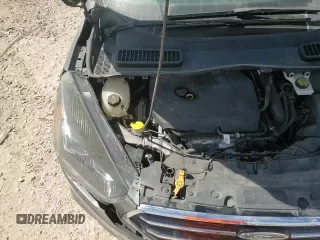 2018 Ford Escape SE z VIN 1FMCU9GD6JUD48647, wystawiony jako Copart lot #70868345 z przebiegiem 102 072 mil mil oraz Szkoda całkowita • Salvage title. Historia ofert i sprzedaży dostępna na DreamBid. Obrazek 16.