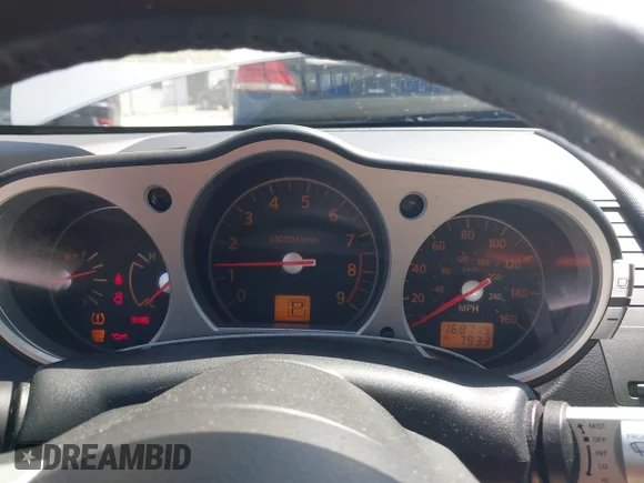 ✅ 2007 Nissan 350Z Enthusiast • VIN: JN1BZ34D97M501164 • Lot: 42790723. Wystawiony na IAAI z przebiegiem 168 715 mil. Bezpłatny archiwum sprzedaży aukcyjnych z USA i szczegółowy raport historii pojazdu na DreamBid. Zdjęcie 7.