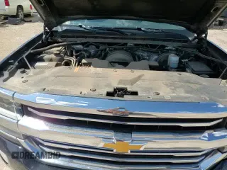 ✅ 2018 Chevrolet Silverado 1500 High Country • VIN: 3GCUKTEC7JG215906 • Лот: 63675725. Опубликован ранее на Copart с пробегом 104 345 миль. Бесплатный доступ к архиву аукционных продаж из США и подробный отчёт об истории автомобиля на DreamBid. Изображение 13.