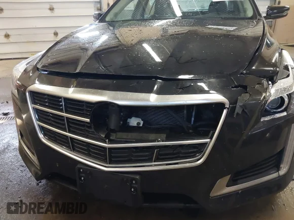✅ 2014 Cadillac CTS Luxury AWD • VIN: 1G6AX5SX3E0125804 • Лот: 41523158. Опубликован ранее на IAAI с пробегом 149 240 миль. Бесплатный доступ к архиву аукционных продаж из США и подробный отчёт об истории автомобиля на DreamBid. Изображение 6.