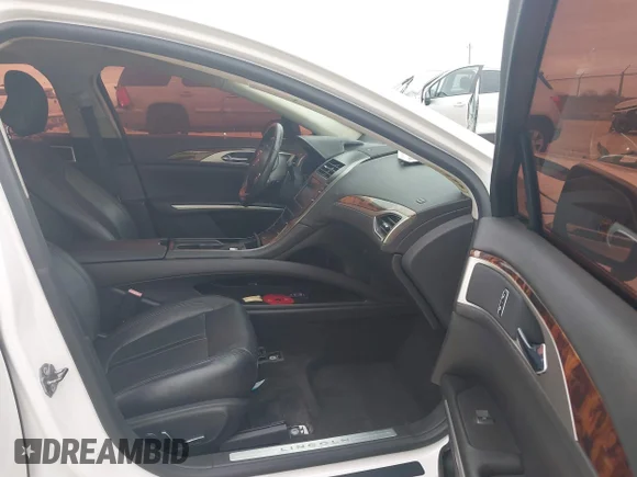 ✅ 2013 Lincoln MKZ • VIN: 3LN6L2GKXDR814985 • Lot: 41547475. Wystawiony na IAAI z przebiegiem 127 391 mil. Bezpłatny archiwum sprzedaży aukcyjnych z USA i szczegółowy raport historii pojazdu na DreamBid. Zdjęcie 5.