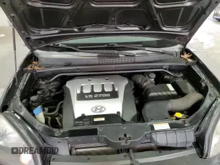 2005 Hyundai Tucson GLS z VIN KM8JN72D15U187310, wystawiony jako Copart lot #84675014 z przebiegiem 149 902 mil mil oraz Czysty tytuł • Clean title. Historia ofert i sprzedaży dostępna na DreamBid. Obrazek 14.