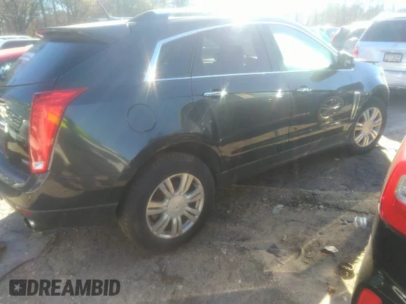 ✅ 2014 Cadillac SRX Luxury Collection • VIN: 3GYFNBE33ES615212 • Lot: 41338318. Wystawiony na IAAI z przebiegiem 228 364 mil. Bezpłatny archiwum sprzedaży aukcyjnych z USA i szczegółowy raport historii pojazdu na DreamBid. Zdjęcie 4.