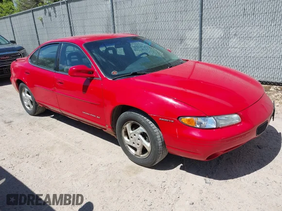 ✅ 1999 Pontiac Grand Prix SE • VIN: 1G2WJ52K1XF350185 • Lot: 45022376. Listed on IAAI with 115,040 mi. Free auction sales archive from the USA and detailed vehicle history report at DreamBid. Image 1.