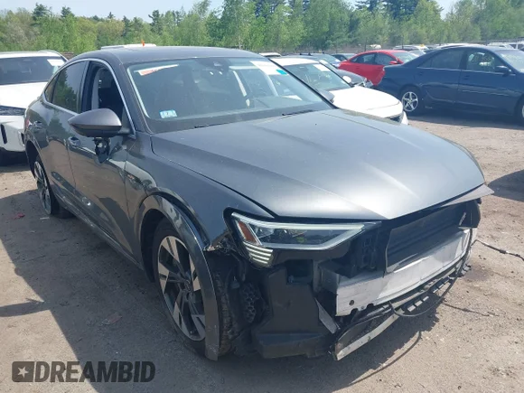 ✅ 2021 Audi e-tron Sportback Premium Plus • VIN: WA12AAGE9MB013105 • Lot: 45041060. Wystawiony na IAAI z przebiegiem 62 164 mil. Bezpłatny archiwum sprzedaży aukcyjnych z USA i szczegółowy raport historii pojazdu na DreamBid. Zdjęcie 1.
