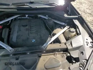 ✅ 2022 BMW X5 xDrive40i • VIN: 5UXCR6C06N9J34112 • Лот: 85155465. Опубликован ранее на Copart с пробегом 124 361 миль. Бесплатный доступ к архиву аукционных продаж из США и подробный отчёт об истории автомобиля на DreamBid. Изображение 14.