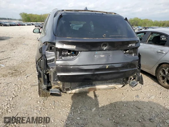 ✅ 2018 BMW X5 xDrive35i • VIN: 5UXKR0C52J0X96675 • Лот: 47121493. Опубликован ранее на Copart с пробегом 77 692 миль. Бесплатный доступ к архиву аукционных продаж из США и подробный отчёт об истории автомобиля на DreamBid. Изображение 6.