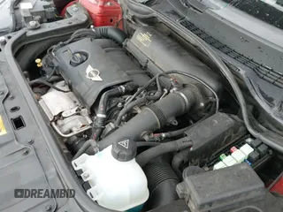 ✅ 2013 MINI Paceman S ALL4 • VIN: WMWSS7C5XDWN71689 • Lot: 41403679. Wystawiony na IAAI z przebiegiem 73 040 mil. Bezpłatny archiwum sprzedaży aukcyjnych z USA i szczegółowy raport historii pojazdu na DreamBid. Zdjęcie 20.