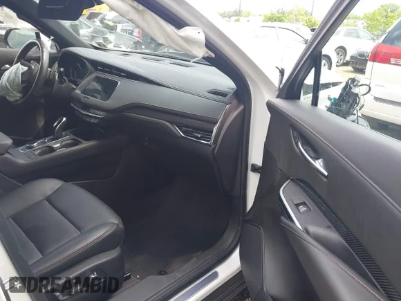 ✅ 2023 Cadillac XT4 AWD Sport • VIN: 1GYFZFR49PF193839 • Lot: 42689517. Wystawiony na IAAI z przebiegiem 23 456 mil. Bezpłatny archiwum sprzedaży aukcyjnych z USA i szczegółowy raport historii pojazdu na DreamBid. Zdjęcie 5.