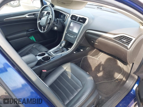 ✅ 2013 Ford Fusion SE Hybrid • VIN: 3FA6P0LU0DR157219 • Lot: 43070785. Wystawiony na IAAI z przebiegiem 128 336 mil. Bezpłatny archiwum sprzedaży aukcyjnych z USA i szczegółowy raport historii pojazdu na DreamBid. Zdjęcie 5.