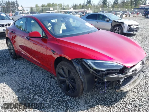 ✅ 2023 Tesla Model S • VIN: 5YJSA1E5XPF516779 • Lot: 42110737. Listed on IAAI with 16,465 mi. Free auction sales archive from the USA and detailed vehicle history report at DreamBid. Image 1.