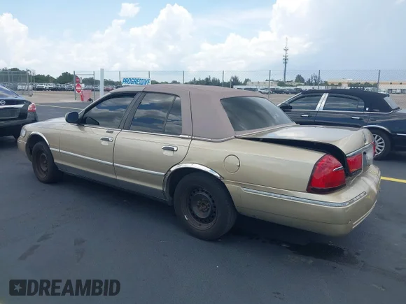✅ 1999 Mercury Grand Marquis LS • VIN: 2MEFM75W7XX665959 • Lot: 42187818. Wystawiony na IAAI z przebiegiem 123 126 mil. Bezpłatny archiwum sprzedaży aukcyjnych z USA i szczegółowy raport historii pojazdu na DreamBid. Zdjęcie 3.