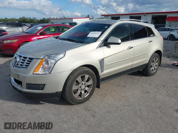 ✅ 2014 Cadillac SRX Luxury Collection • VIN: 3GYFNBE34ES566697 • Lot: 41690934. Wystawiony na IAAI z przebiegiem 85 757 mil. Bezpłatny archiwum sprzedaży aukcyjnych z USA i szczegółowy raport historii pojazdu na DreamBid. Zdjęcie 2.