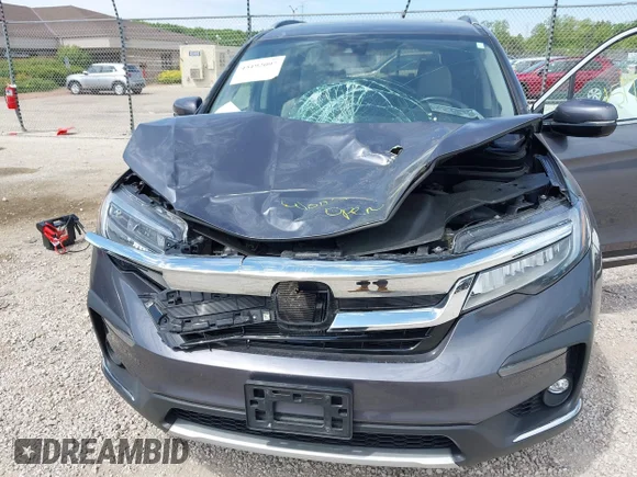 ✅ 2021 Honda Pilot Touring 8-Passenger • VIN: 5FNYF6H92MB004808 • Лот: 45192097. Опубліковано раніше на IAAI з пробігом 99 149 миль. Безкоштовний доступ до архіву аукціонних продажів зі США та докладний звіт про історію автомобіля на DreamBid. Зображення 6.