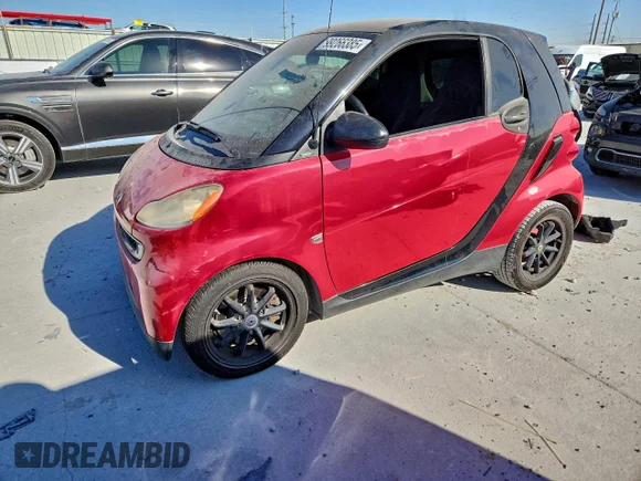 ✅ 2009 Smart fortwo Pure • VIN: WMEEJ31X79K280342 • Lot: 99266385. Listed on Copart with 99,291 mi. Free auction sales archive from the USA and detailed vehicle history report at DreamBid. Image 1.