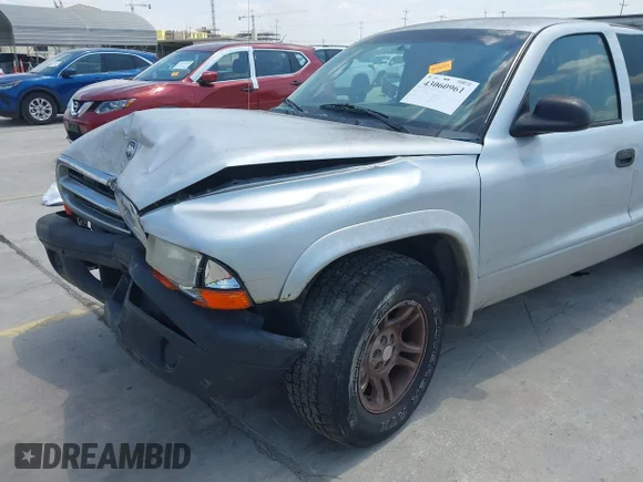 ✅ 2004 Dodge Dakota • VIN: 1D7GL12K74S663494 • Lot: 43060961. Wystawiony na IAAI z przebiegiem 250 832 mil. Bezpłatny archiwum sprzedaży aukcyjnych z USA i szczegółowy raport historii pojazdu na DreamBid. Zdjęcie 6.