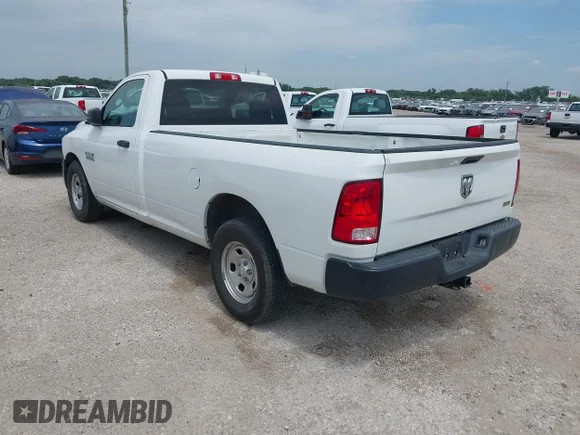✅ 2018 Ram 1500 Tradesman • VIN: 3C6JR6DG0JG318130 • Lot: 45402823. Listed on IAAI with 68,426 mi. Free auction sales archive from the USA and detailed vehicle history report at DreamBid. Image 3.