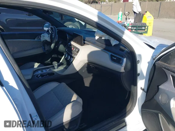 ✅ 2023 Genesis G70 3.3T • VIN: KMTG54TE8PU120003 • Лот: 41279709. Опубликован ранее на IAAI с пробегом 21 244 миль. Бесплатный доступ к архиву аукционных продаж из США и подробный отчёт об истории автомобиля на DreamBid. Изображение 5.