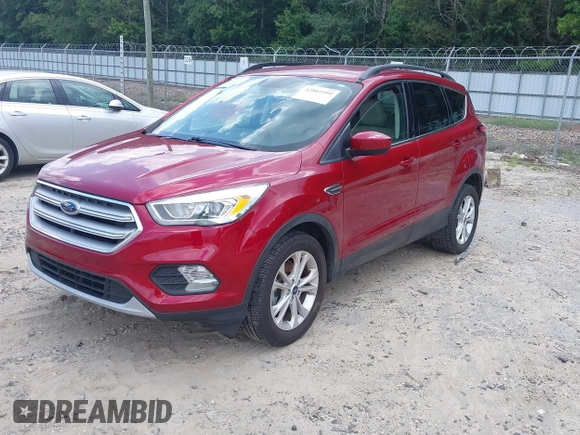 ✅ 2018 Ford Escape SEL • VIN: 1FMCU0HD9JUD40911 • Lot: 42801999. Wystawiony na IAAI z przebiegiem 116 961 mil. Bezpłatny archiwum sprzedaży aukcyjnych z USA i szczegółowy raport historii pojazdu na DreamBid. Zdjęcie 2.