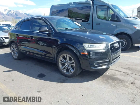 ✅ 2015 Audi Q3 Prestige • VIN: WA1GFCFS5FR009251 • Lot: 42075604. Listed on IAAI with 124,971 mi. Free auction sales archive from the USA and detailed vehicle history report at DreamBid. Image 1.