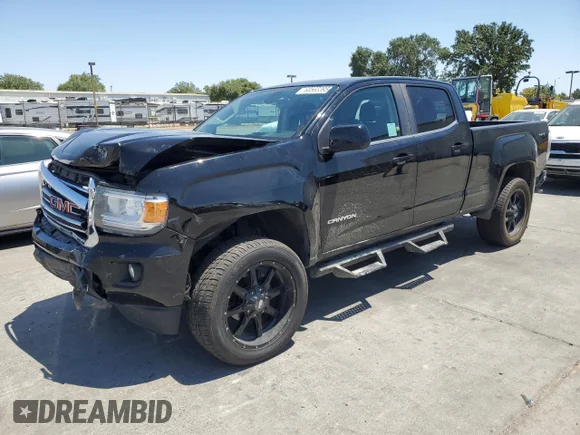 ✅ 2017 GMC Canyon 4WD SLE • VIN: 1GTG6CEN7H1301289 • Лот: 60563395. Опубликован ранее на Copart с пробегом 97 055 миль. Бесплатный доступ к архиву аукционных продаж из США и подробный отчёт об истории автомобиля на DreamBid. Изображение 1.