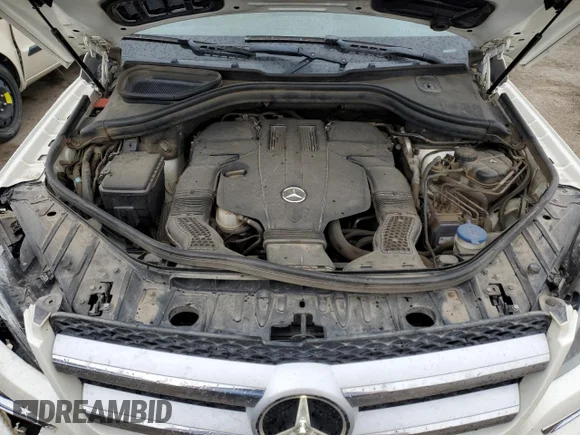 ✅ 2015 Mercedes-Benz GL 450 • VIN: 4JGDF6EE2FA451730 • Lot: 70329702. Wystawiony na Copart z przebiegiem 119 340 mil. Bezpłatny archiwum sprzedaży aukcyjnych z USA i szczegółowy raport historii pojazdu na DreamBid. Zdjęcie 12.