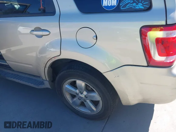 ✅ 2010 Ford Escape Limited • VIN: 1FMCU0EG5AKA11407 • Лот: 45652102. Опубліковано раніше на IAAI з пробігом 127 630 миль. Безкоштовний доступ до архіву аукціонних продажів зі США та докладний звіт про історію автомобіля на DreamBid. Зображення 6.