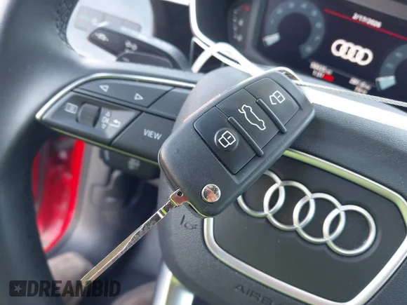 ✅ 2022 Audi Q3 S line Premium • VIN: WA1DECF34N1125116 • Lot: 44390047. Wystawiony na IAAI z przebiegiem 58 425 mil. Bezpłatny archiwum sprzedaży aukcyjnych z USA i szczegółowy raport historii pojazdu na DreamBid. Zdjęcie 11.