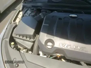 2019 Chevrolet Impala Premier z VIN 1G1105S35KU126237, wystawiony jako Copart lot #61374535 z przebiegiem 103 873 mil mil oraz Szkoda całkowita • Salvage title. Historia ofert i sprzedaży dostępna na DreamBid. Obrazek 13.