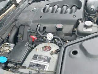 ✅ 2003 Jaguar XK • VIN: SAJDA42C932A32083 • Lot: 42632461. Listed on IAAI with 32,581 mi. Free auction sales archive from the USA and detailed vehicle history report at DreamBid. Image 15.