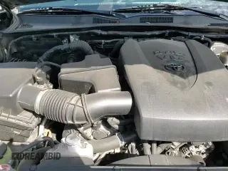 ✅ 2018 Toyota Tacoma TRD Sport • VIN: 3TMAZ5CN8JM067846 • Лот: 81731315. Опубликован ранее на Copart с пробегом 142 630 миль. Бесплатный доступ к архиву аукционных продаж из США и подробный отчёт об истории автомобиля на DreamBid. Изображение 13.