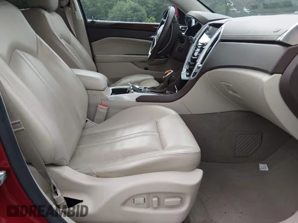✅ 2013 Cadillac SRX Premium Collection • VIN: 3GYFNJE30DS553633 • Lot: 45407677. Wystawiony na IAAI z przebiegiem 100 953 mil. Bezpłatny archiwum sprzedaży aukcyjnych z USA i szczegółowy raport historii pojazdu na DreamBid. Zdjęcie 5.