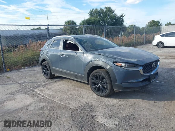 ✅ 2025 Mazda CX-30 S Carbon Edition • VIN: 3MVDMBCM1SM786275 • Lot: 43818541. Listed on IAAI with 3,391 mi. Free auction sales archive from the USA and detailed vehicle history report at DreamBid. Image 1.