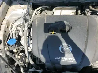 ✅ 2018 Mazda 3 Touring • VIN: 3MZBN1V30JM203078 • Лот: 82411535. Опубликован ранее на Copart с пробегом 129 812 миль. Бесплатный доступ к архиву аукционных продаж из США и подробный отчёт об истории автомобиля на DreamBid. Изображение 16.